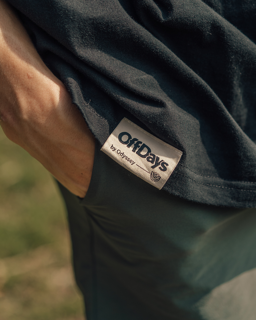 black graphic t shirt with woven tag out of office