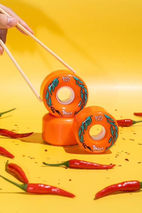 orange longboard and surfskate wheels