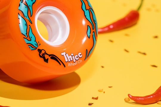 orange longboard and surfskate wheels