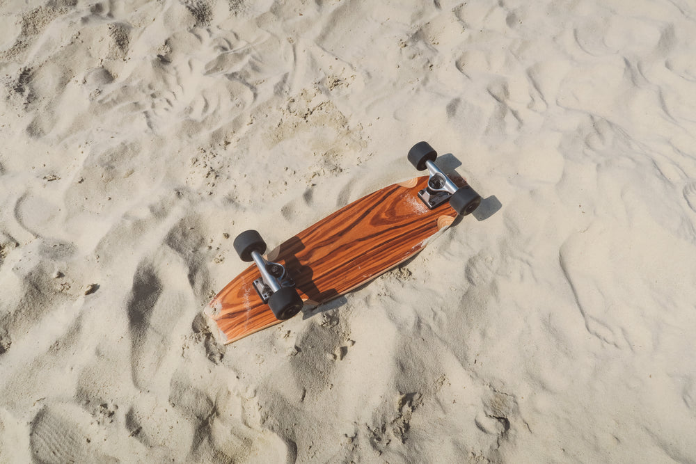 Maple wood cruiser on sand