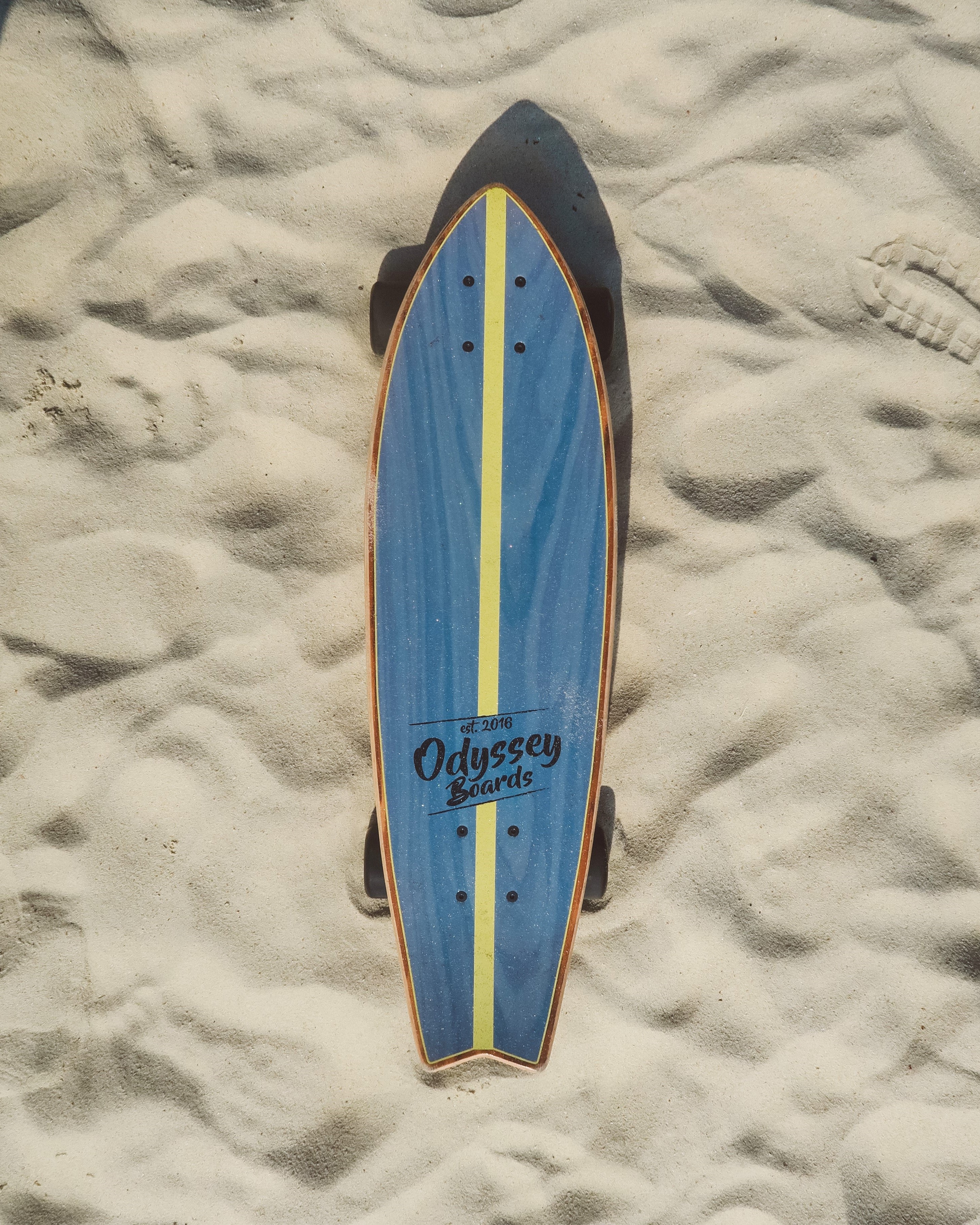 Cruiser board on sand